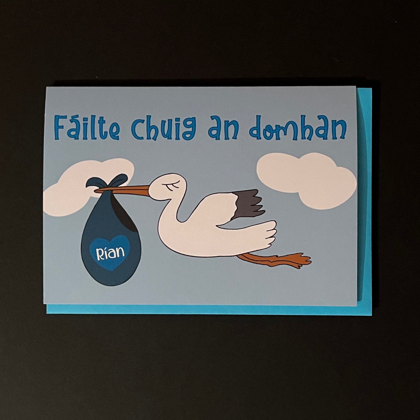 Fáilte chuig an domhan - Stócach (Gorm)