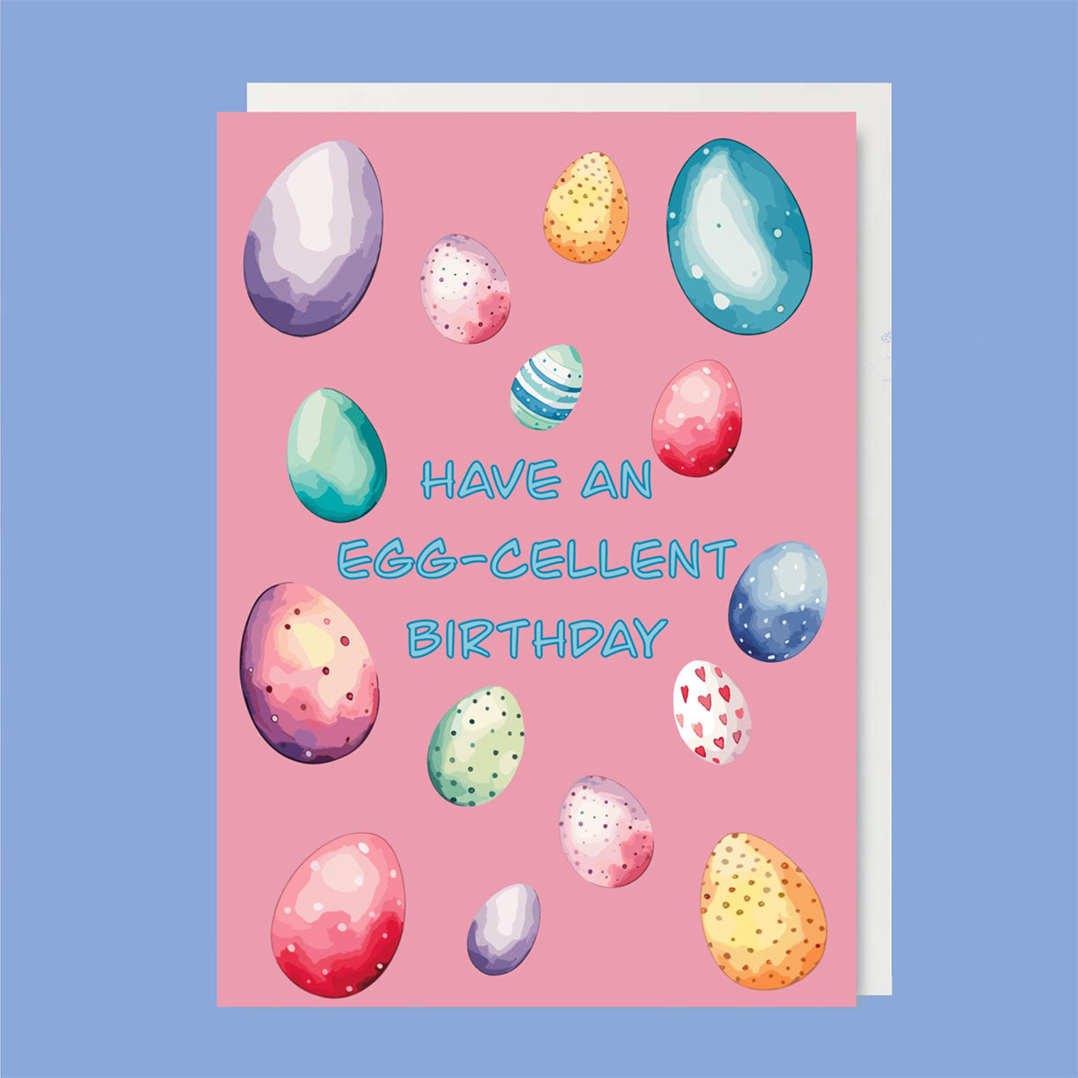 Greeting card with watercolour Easter eggs, sentiment reads "Have an egg-cellent birthday"